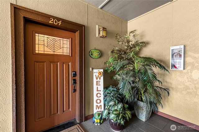 1051 N Baker Ave Unit B204, East Wenatchee, WA 98802 - property entrance with stucco siding