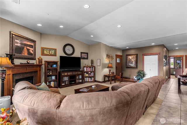 1051 N Baker Ave Unit B204, East Wenatchee, WA 98802 - living area featuring recessed lighting, light tile patterned floors, a fireplace, lofted ceiling, and baseboards
