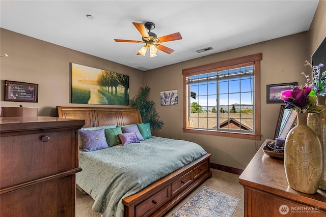 1051 N Baker Ave Unit B204, East Wenatchee, WA 98802 - bedroom with light carpet, baseboards, and a ceiling fan