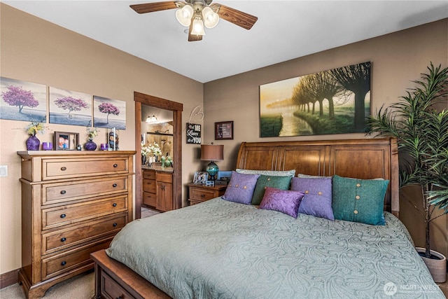 1051 N Baker Ave Unit B204, East Wenatchee, WA 98802 - bedroom featuring light carpet, connected bathroom, a ceiling fan, and baseboards