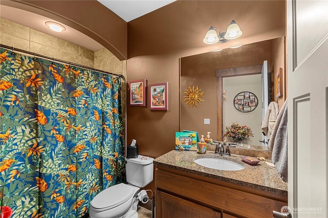 1051 N Baker Ave Unit B204, East Wenatchee, WA 98802 - bathroom featuring vanity, toilet, and a shower with shower curtain