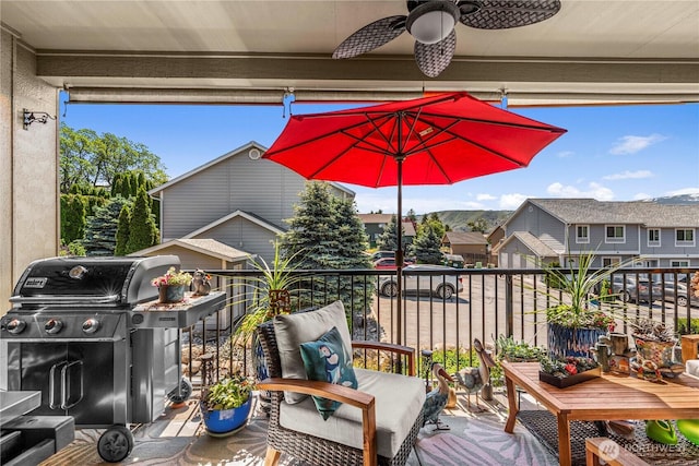 1051 N Baker Ave Unit B204, East Wenatchee, WA 98802 - balcony featuring area for grilling, ceiling fan, and a residential view
