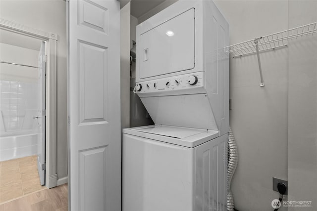 3501 Colby Ave Unit 301, Everett, WA 98201 - washroom featuring stacked washer and clothes dryer