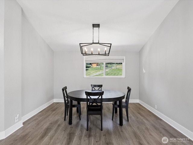 7315 294th St NE, Arlington, WA 98223 - dining space featuring wood finished floors and a chandelier