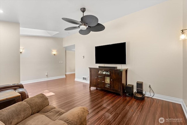 447 E Pointes Dr E, Shelton, WA 98584 - living area featuring ceiling fan, wood finished floors, baseboards, and a skylight