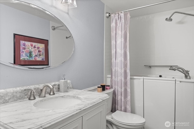 447 E Pointes Dr E, Shelton, WA 98584 - full bath with vanity, toilet, and a shower with shower curtain