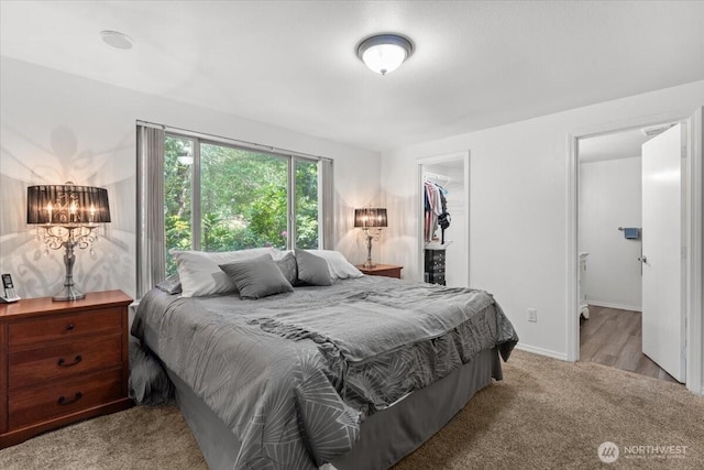 447 E Pointes Dr E, Shelton, WA 98584 - carpeted bedroom with a walk in closet, a closet, and baseboards