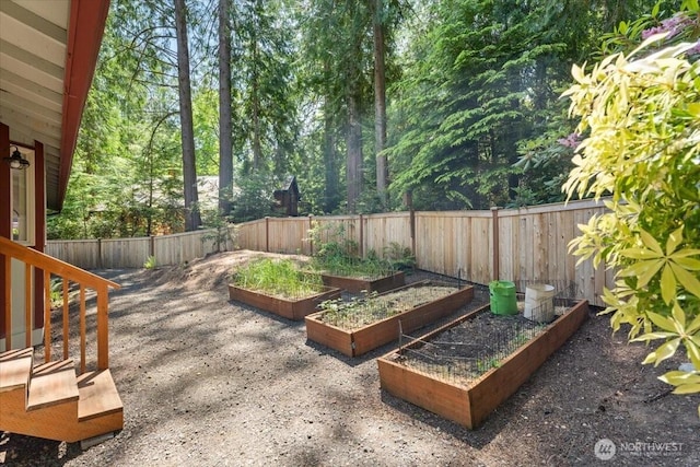 447 E Pointes Dr E, Shelton, WA 98584 - fenced backyard with a garden