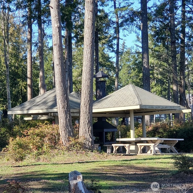 447 E Pointes Dr E, Shelton, WA 98584 - view of side of property featuring a gazebo and roof with shingles