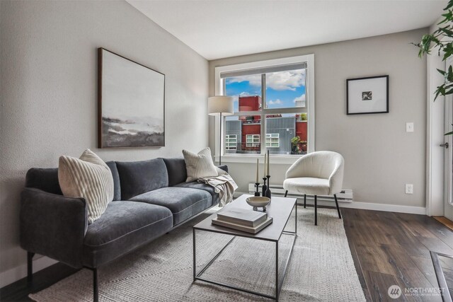 769 Hayes St Unit 504, Seattle, WA 98109 - living room featuring wood finished floors and baseboards
