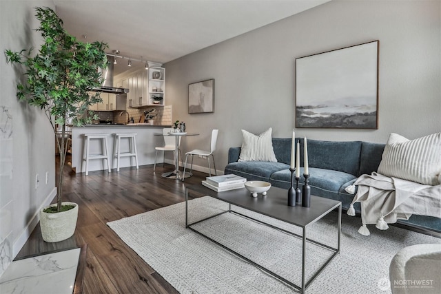 769 Hayes St Unit 504, Seattle, WA 98109 - living area featuring wood finished floors and baseboards
