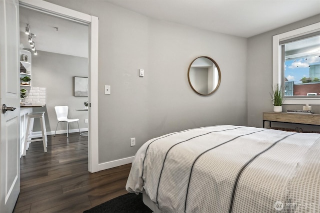 769 Hayes St Unit 504, Seattle, WA 98109 - bedroom with wood finished floors and baseboards