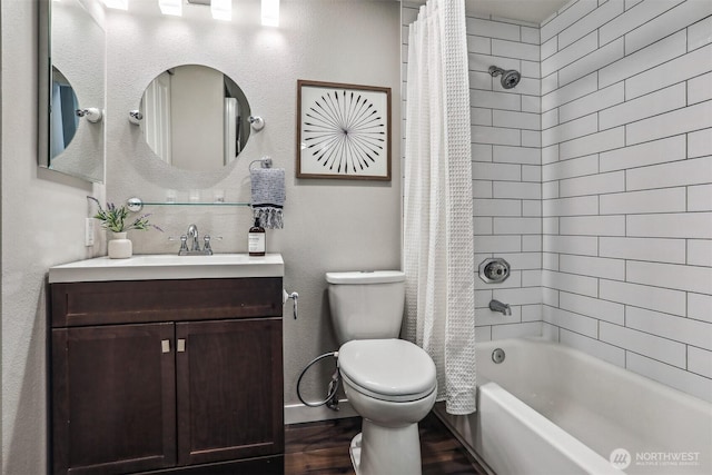 769 Hayes St Unit 504, Seattle, WA 98109 - bathroom featuring toilet, vanity, shower / tub combo with curtain, and wood finished floors