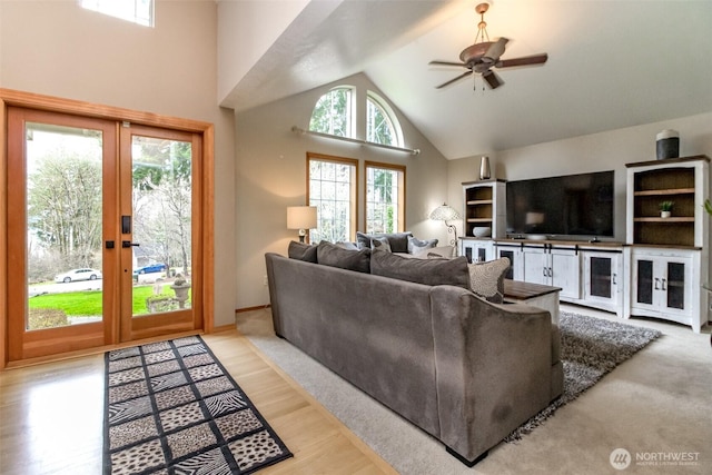2634 59th Ave NW, Olympia, WA 98502 - living room featuring french doors, high vaulted ceiling, and ceiling fan