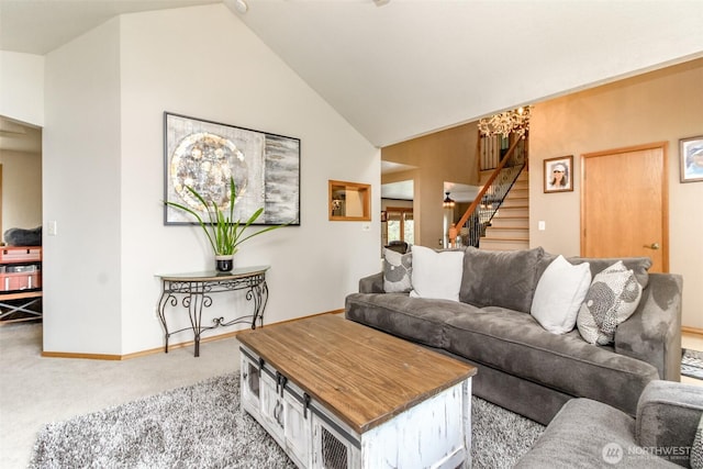 2634 59th Ave NW, Olympia, WA 98502 - living room featuring light carpet, stairway, and high vaulted ceiling