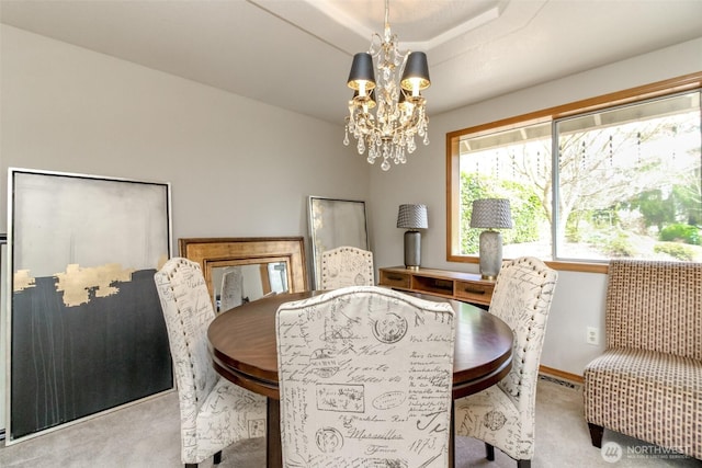 2634 59th Ave NW, Olympia, WA 98502 - dining space featuring carpet flooring and a chandelier