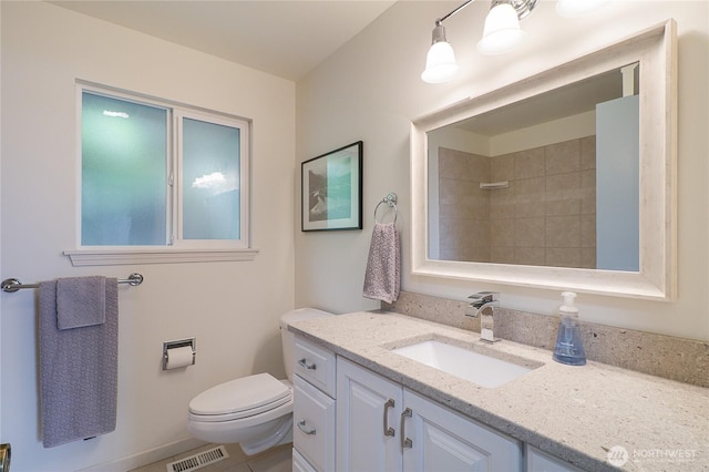 12649 Shorewood Dr SW, Burien, WA 98146 - full bathroom featuring toilet, vanity, and a tile shower