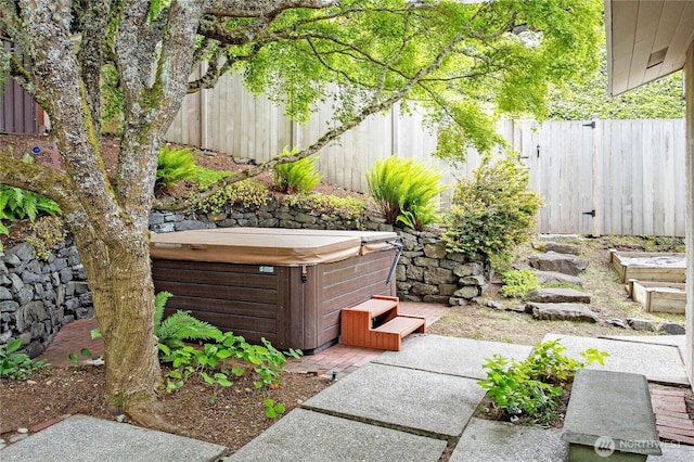 12649 Shorewood Dr SW, Burien, WA 98146 - view of patio / terrace featuring a hot tub