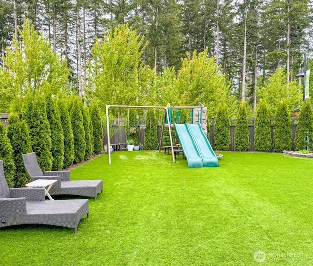 32938 Ash Ave SE, Black Diamond, WA 98010 - view of playground featuring view of wooded area