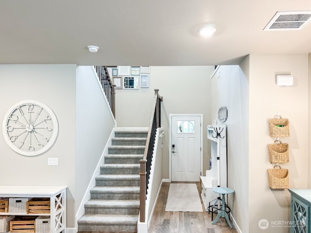 32938 Ash Ave SE, Black Diamond, WA 98010 - entryway with stairway, wood finished floors, and baseboards