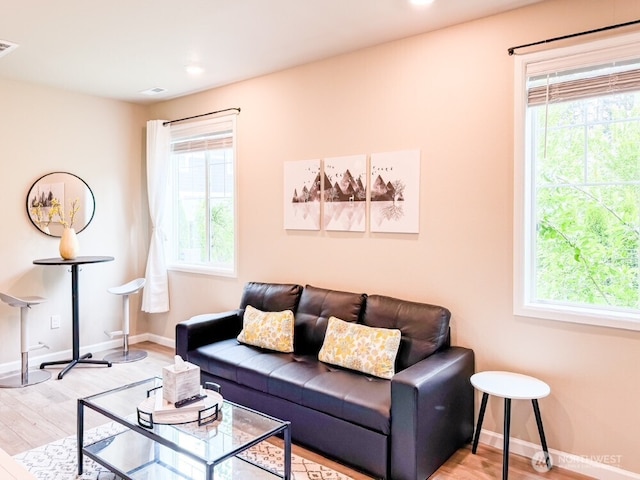 32938 Ash Ave SE, Black Diamond, WA 98010 - living room with plenty of natural light, wood finished floors, baseboards, and recessed lighting
