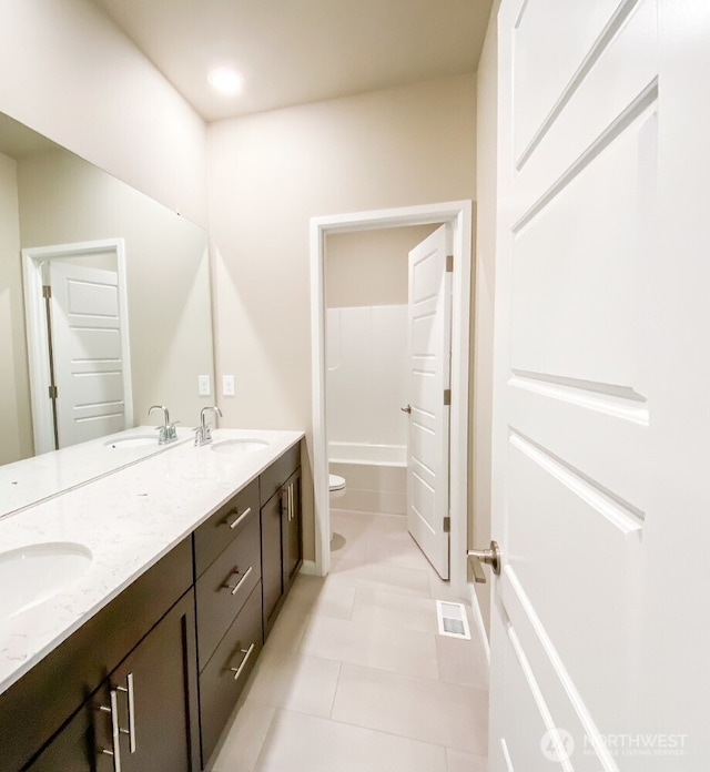 32938 Ash Ave SE, Black Diamond, WA 98010 - bathroom featuring double vanity, a bathtub, toilet, tile patterned floors, and a shower
