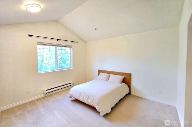 18501 SE Newport Way Unit H335, Issaquah, WA 98027 - carpeted bedroom featuring a baseboard heating unit, lofted ceiling, and baseboards