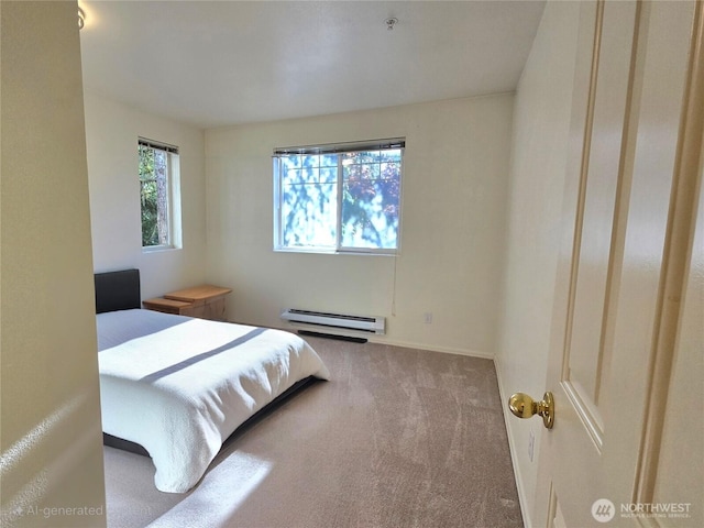 18501 SE Newport Way Unit H335, Issaquah, WA 98027 - bedroom featuring carpet, a baseboard radiator, and baseboards