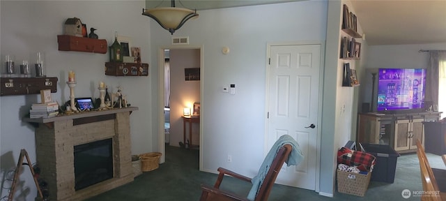 19425 Grant Rd NW, Soap Lake, WA 98851 - carpeted living room featuring a fireplace