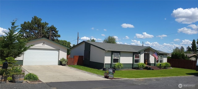 19425 Grant Rd NW, Soap Lake, WA 98851 - view of front of house featuring a garage, driveway, and an outdoor structure