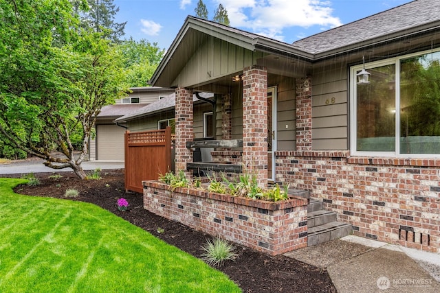 58 Pacific Pl, Longview, WA 98632 - entrance to property featuring an attached garage and brick siding