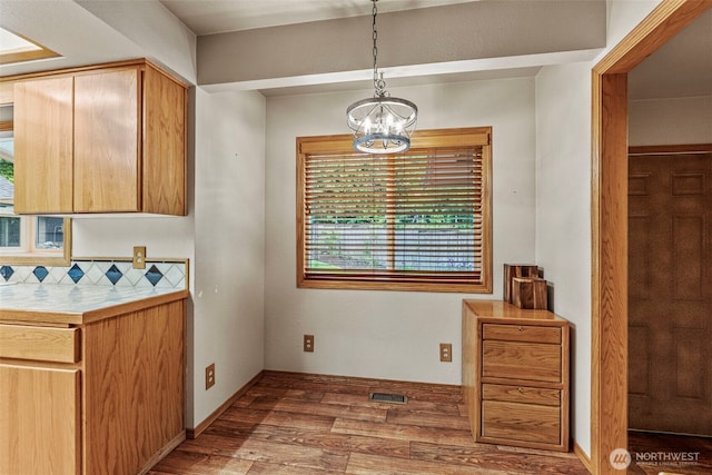 58 Pacific Pl, Longview, WA 98632 - dining space with wood finished floors and a chandelier