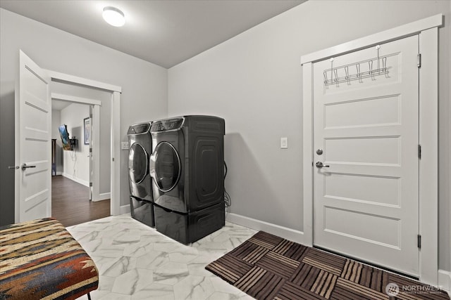 23145 65th St E, Buckley, WA 98321 - laundry room with washer and dryer, baseboards, and marble finish flooring