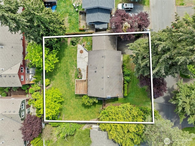 aerial view of property and surrounding area with property parcel outlined