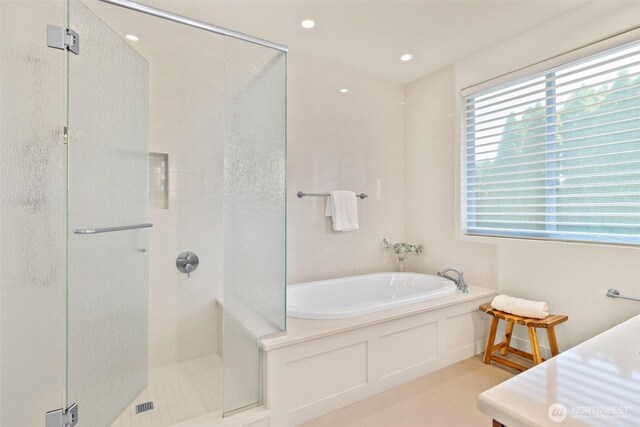 9120 NE 25th Pl, Clyde Hill, WA 98004 - full bath featuring a shower stall, a garden tub, recessed lighting, and tile patterned floors
