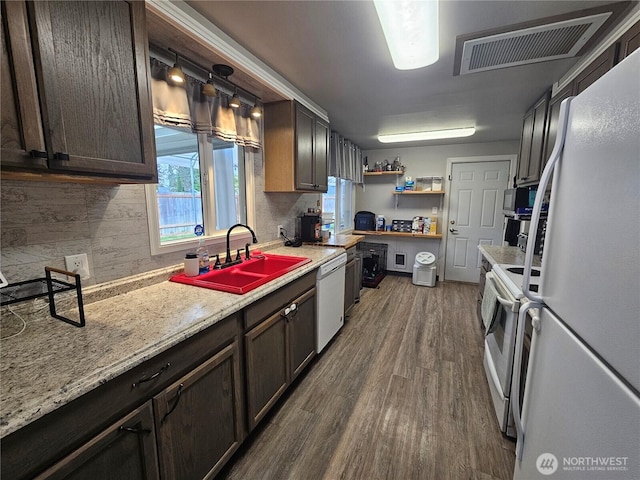 10915 Davisson Rd SW, Lakewood, WA 98499 - kitchen featuring white appliances, a sink, dark wood-type flooring, open shelves, and tasteful backsplash