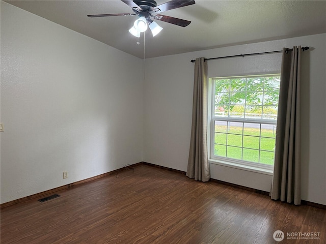 1710 263rd St, Ocean Park, WA 98640 - spare room with wood finished floors, a ceiling fan, and baseboards