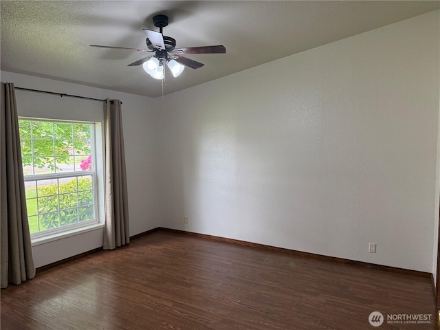 1710 263rd St, Ocean Park, WA 98640 - unfurnished room featuring wood finished floors, baseboards, and a ceiling fan