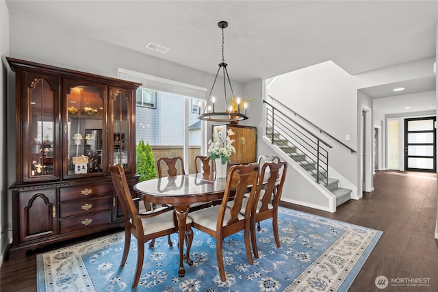 2553 Vardon Cir SW, Port Orchard, WA 98367 - dining space with a chandelier, stairway, dark wood finished floors, recessed lighting, and baseboards