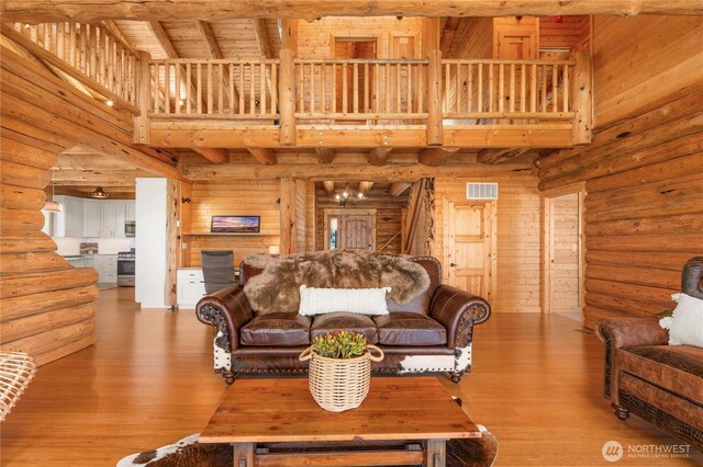 1831 Cottontail Ln, Chelan, WA 98816 - living area featuring wood finished floors and wood ceiling with exposed beams