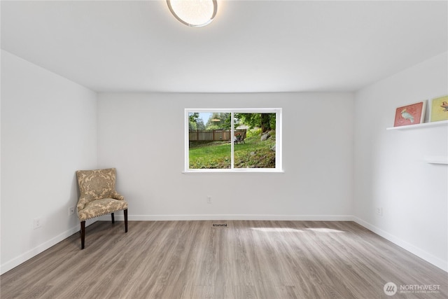 15396 Dewey Crest Ln, Anacortes, WA 98221 - empty room featuring wood finished floors and baseboards
