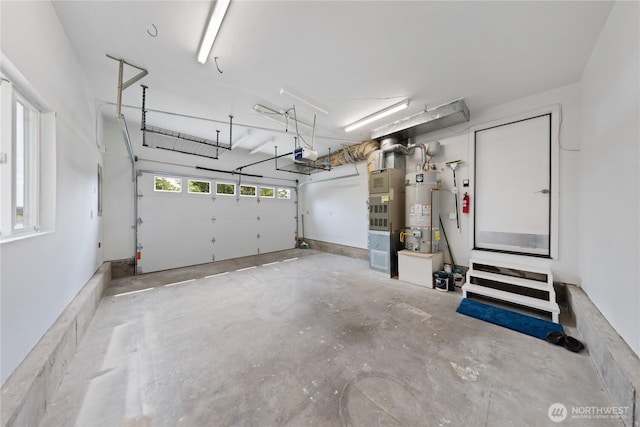 15396 Dewey Crest Ln, Anacortes, WA 98221 - garage with water heater and a garage door opener