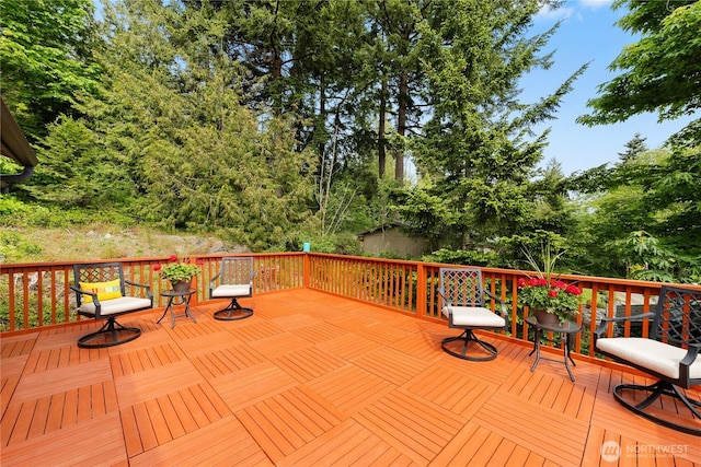 15396 Dewey Crest Ln, Anacortes, WA 98221 - wooden deck featuring view of scattered trees