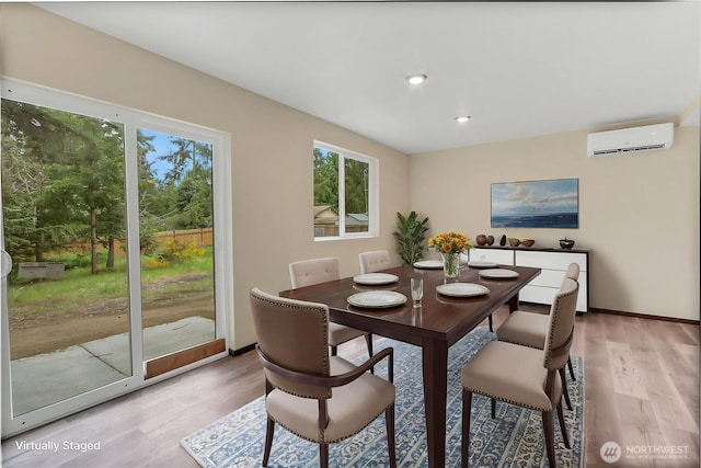 20116 58th Ave E, Spanaway, WA 98387 - dining space featuring a wall mounted AC, light wood-style floors, plenty of natural light, and recessed lighting