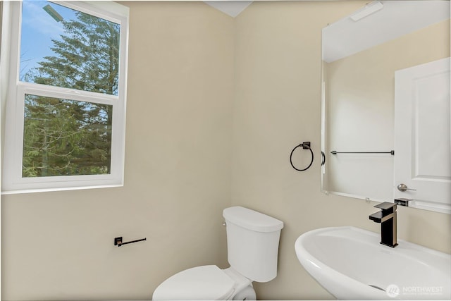 20116 58th Ave E, Spanaway, WA 98387 - half bathroom featuring a sink and toilet