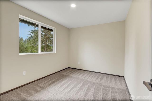 20116 58th Ave E, Spanaway, WA 98387 - spare room featuring carpet flooring and baseboards
