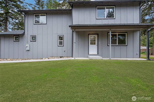20116 58th Ave E, Spanaway, WA 98387 - view of front facade featuring a front lawn and board and batten siding