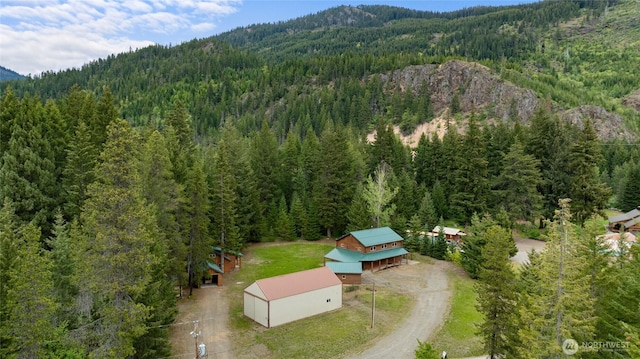4193 Sparks Rd, Easton, WA 98925 - view from above of property featuring a heavily wooded area and mountains
