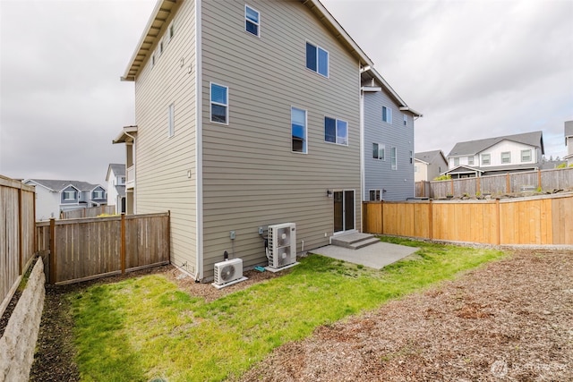 907 Bunting Pl SE, Port Orchard, WA 98366 - back of house with a residential view, a cooling unit, and entry steps