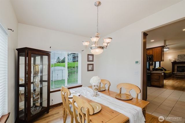 3323 Appaloosa Way, Bremerton, WA 98310 - dining area with light wood-type flooring and a chandelier